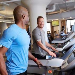 RefreshinQ friends working out on treadmills